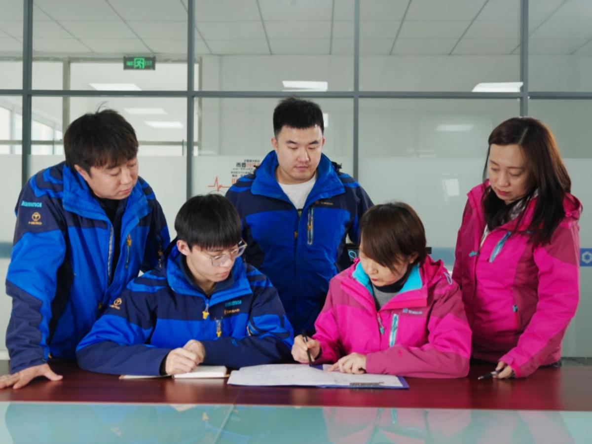 Team reviewing documents